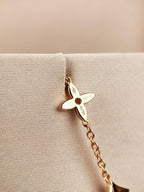 GlowSTAR AND SUN 7 MOTIFS GOLD BRACELET