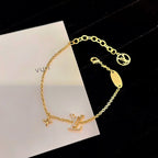 GlowLOGO STAR MOTIF GOLD BRACELET