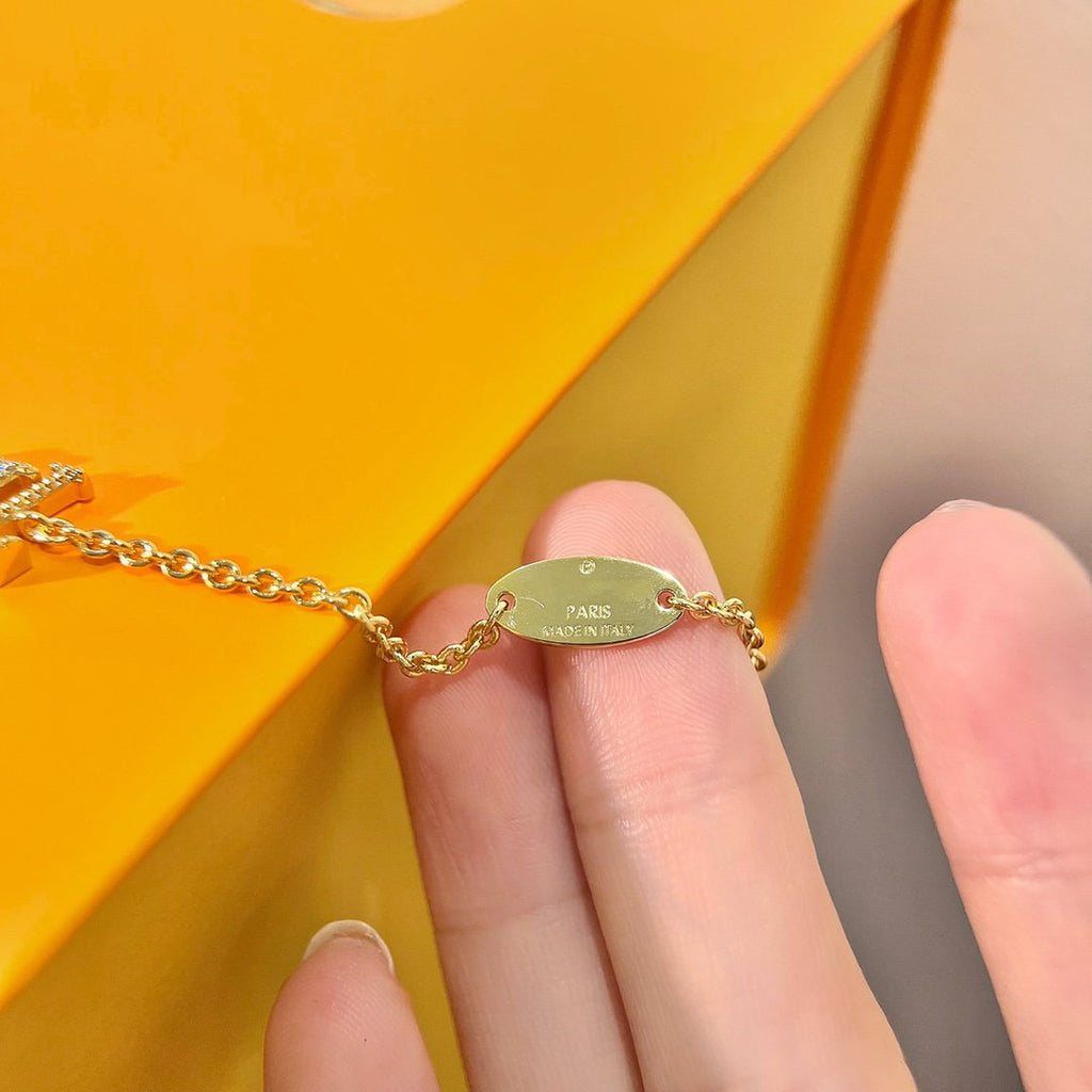 GlowLOGO STAR MOTIF GOLD BRACELET
