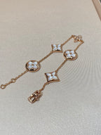 GlowSTAR AND SUN 5 MOTIF MOP PINK GOLD BRACELET