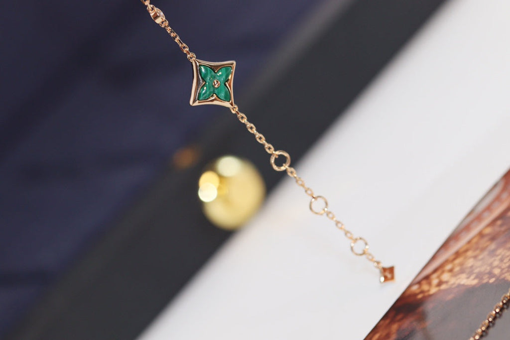 GlowSTAR AND SUN 4 MOTIF PINK GOLD MALACHITE BRACELET