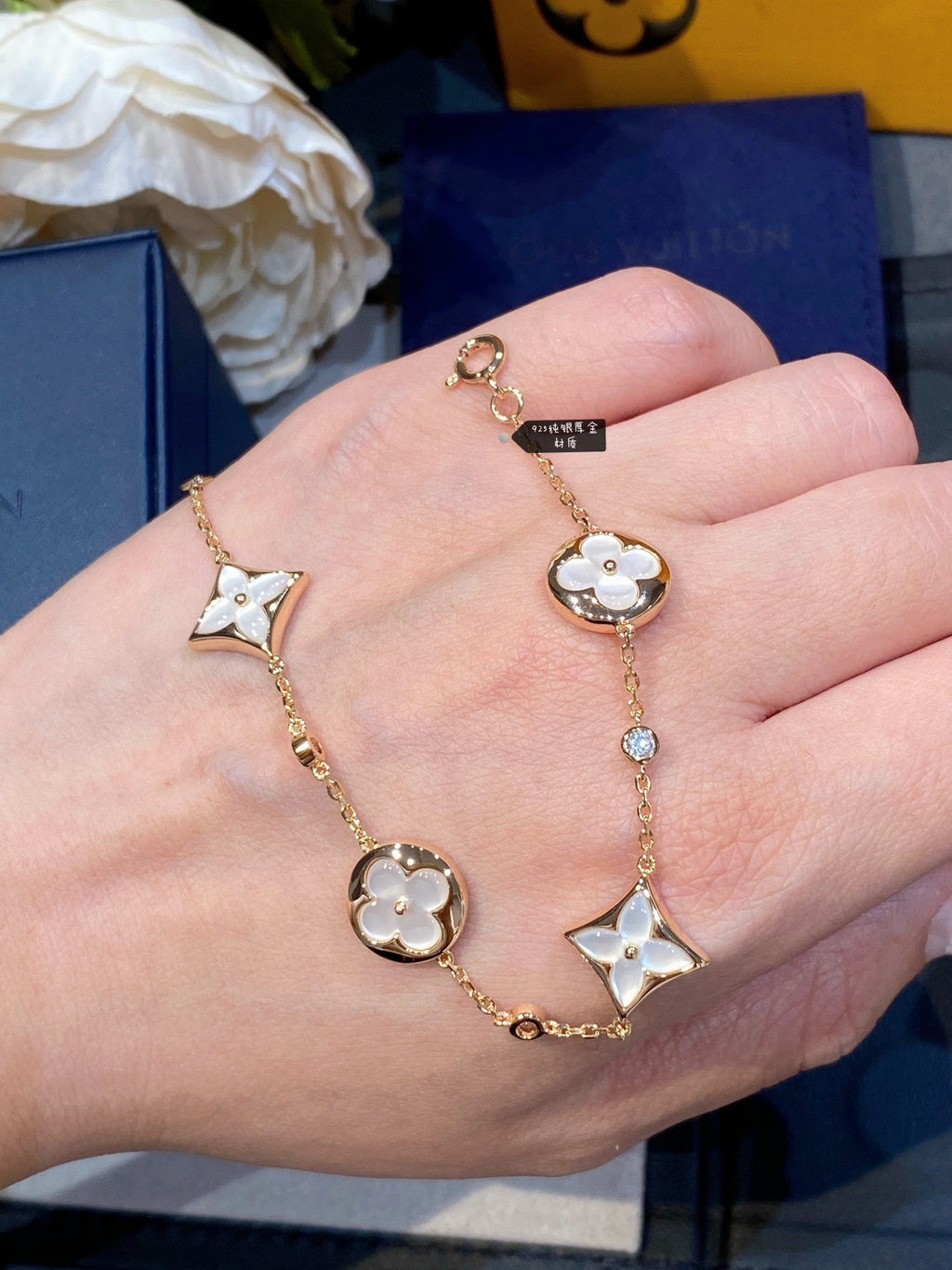 GlowSTAR AND SUN 4 MOTIF WHITE MOP PINK GOLD BRACELET