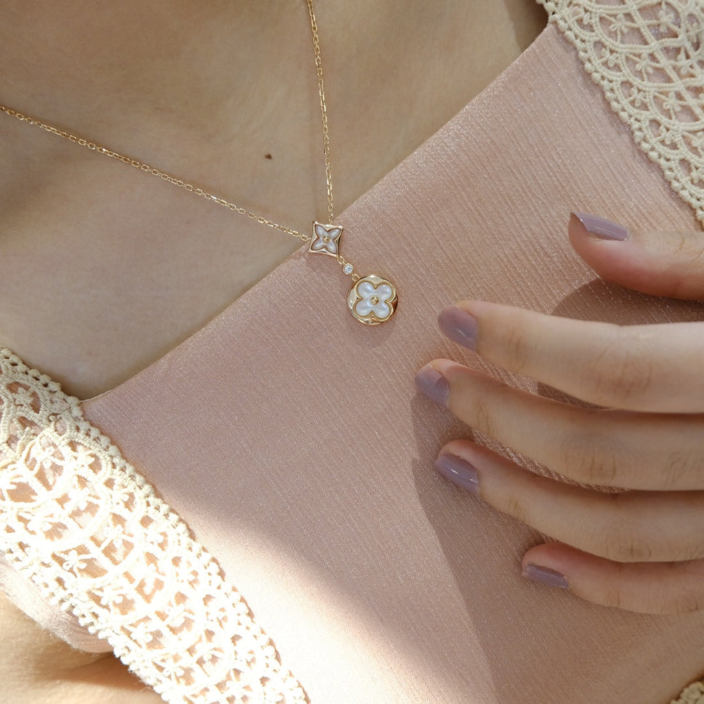 GlowSTAR AND SUN WHITE MOP 2 MOTIF PINK GOLD NECKLACE