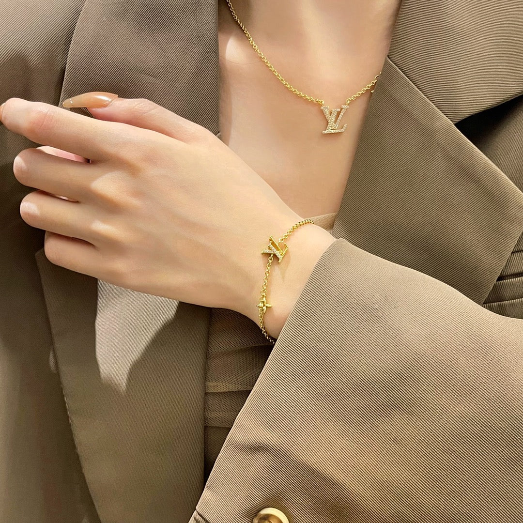 GlowLOGO STAR MOTIF GOLD BRACELET