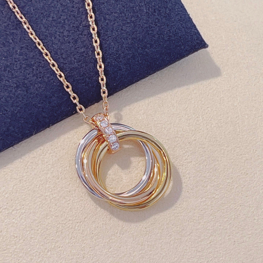 GlowTRINITY NECKLACE GOLD  DIAMONDS