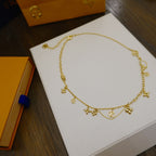 GlowBLOOMING SUPPLE NECKLACE BRASS