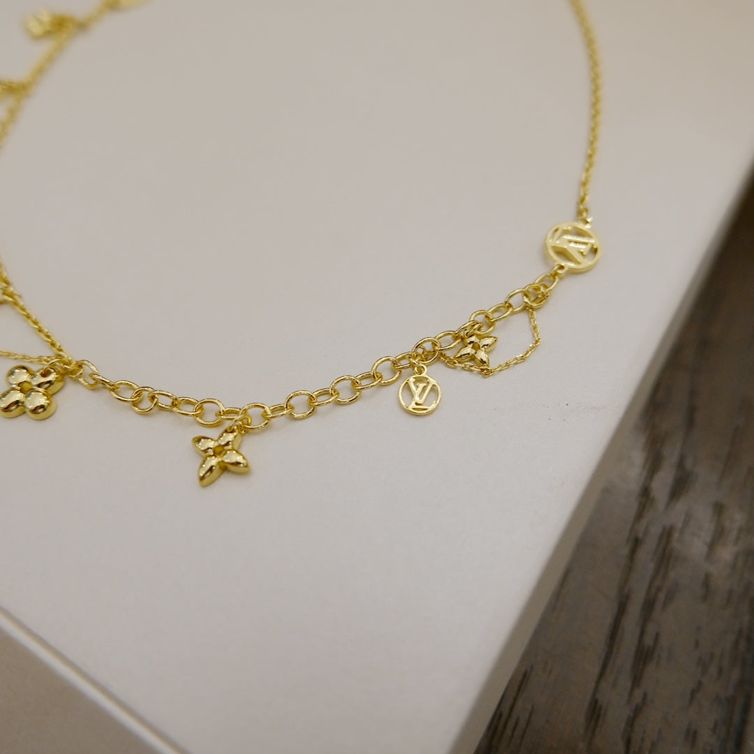 GlowBLOOMING SUPPLE NECKLACE BRASS