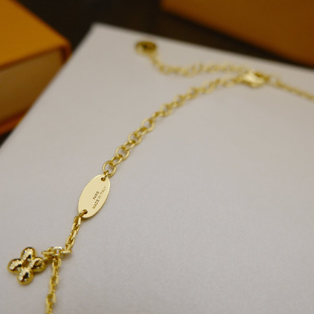 GlowBLOOMING SUPPLE NECKLACE BRASS