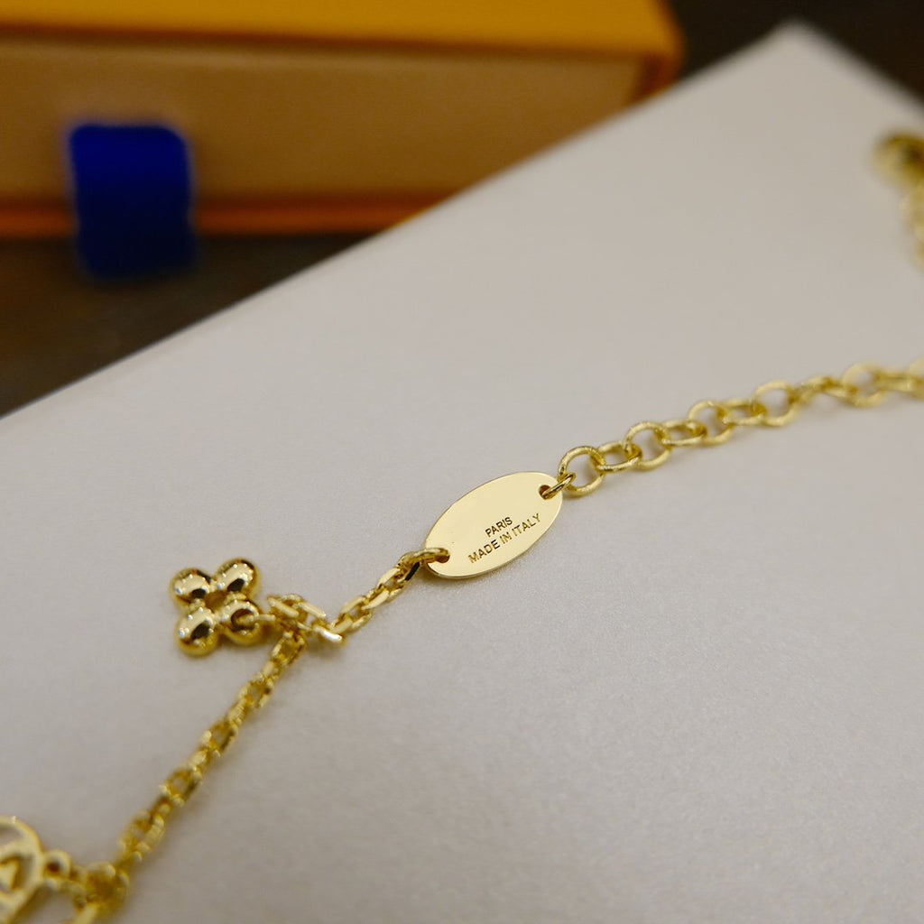 GlowBLOOMING SUPPLE NECKLACE BRASS